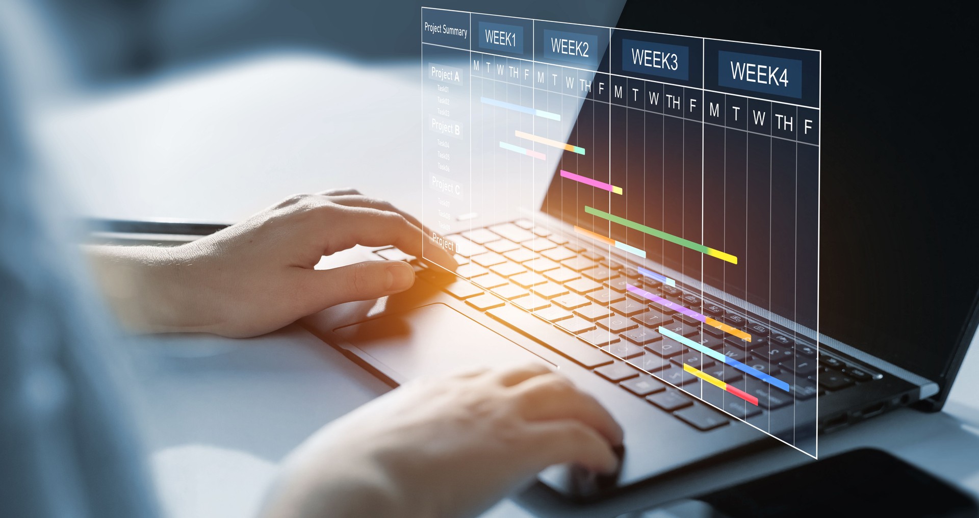Project manager working on laptop and updating tasks and milestones progress planning with Gantt chart scheduling interface for company on virtual screen.  Business Project Management System.